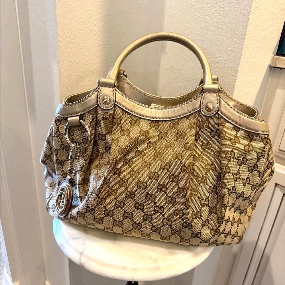 Gucci Sukey Beige and Metallic Monogram tote includes charm with COA